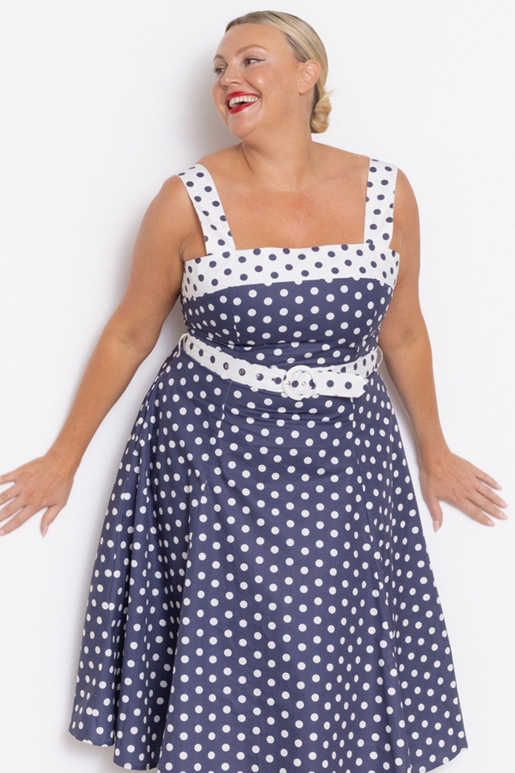 navy and white polka dot midi dress Sunday Navy Polka Dot Midi Dress