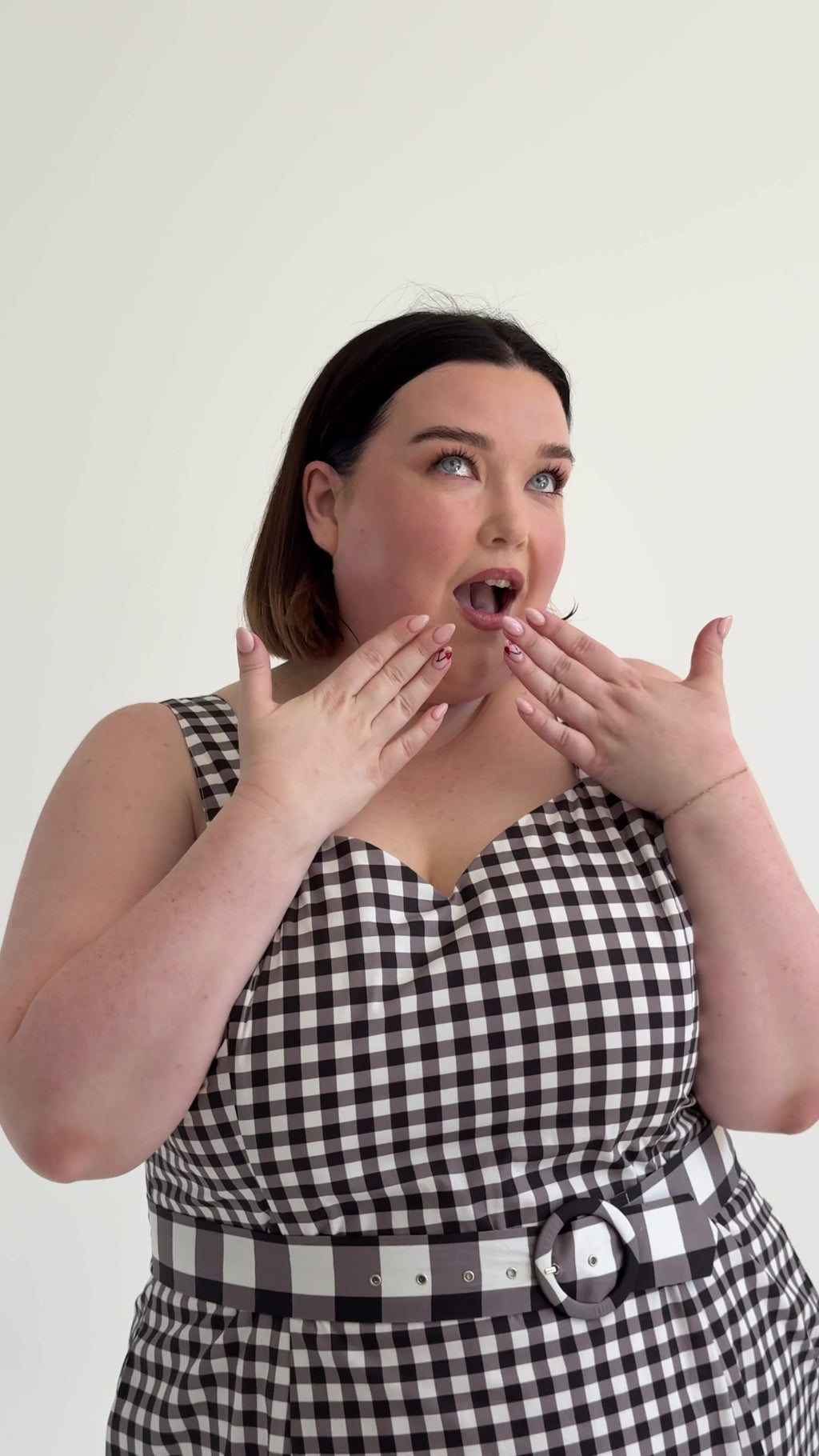 Style video showing Gemini 2 way dress on size 12, 16 and 20. Made from 100% sustainable cotton, this dress has 3 pieces including a belt and jacket. 