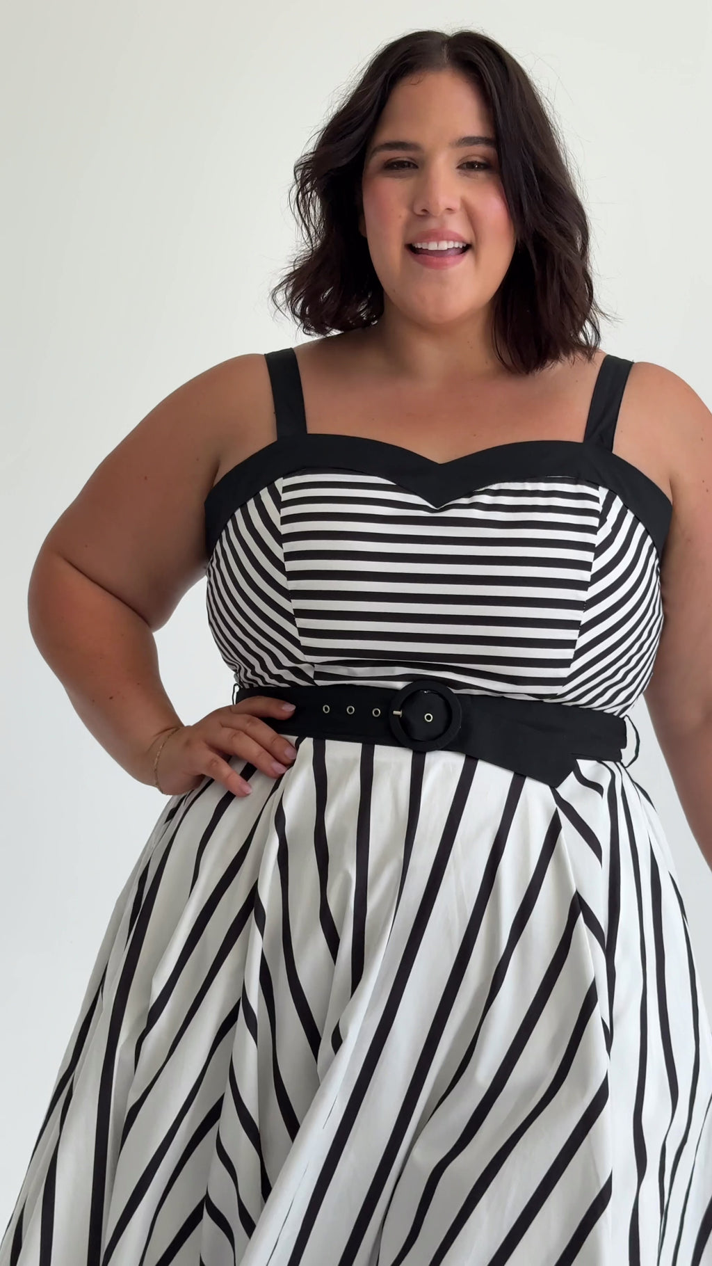 Style video of Cherry Bobbins Rita Midi Dress. Made from sustainable cotton and tulle, shown on models in sizes 12, 16 and 20.